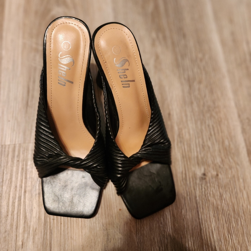 Like new black round heels.